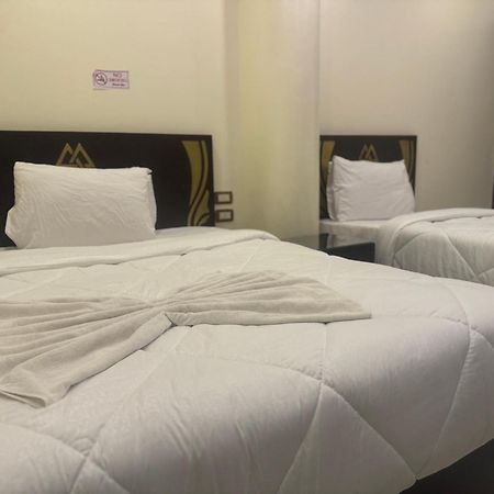 Pyramids And Sphinx Hotel Kafret el-Gabal Buitenkant foto