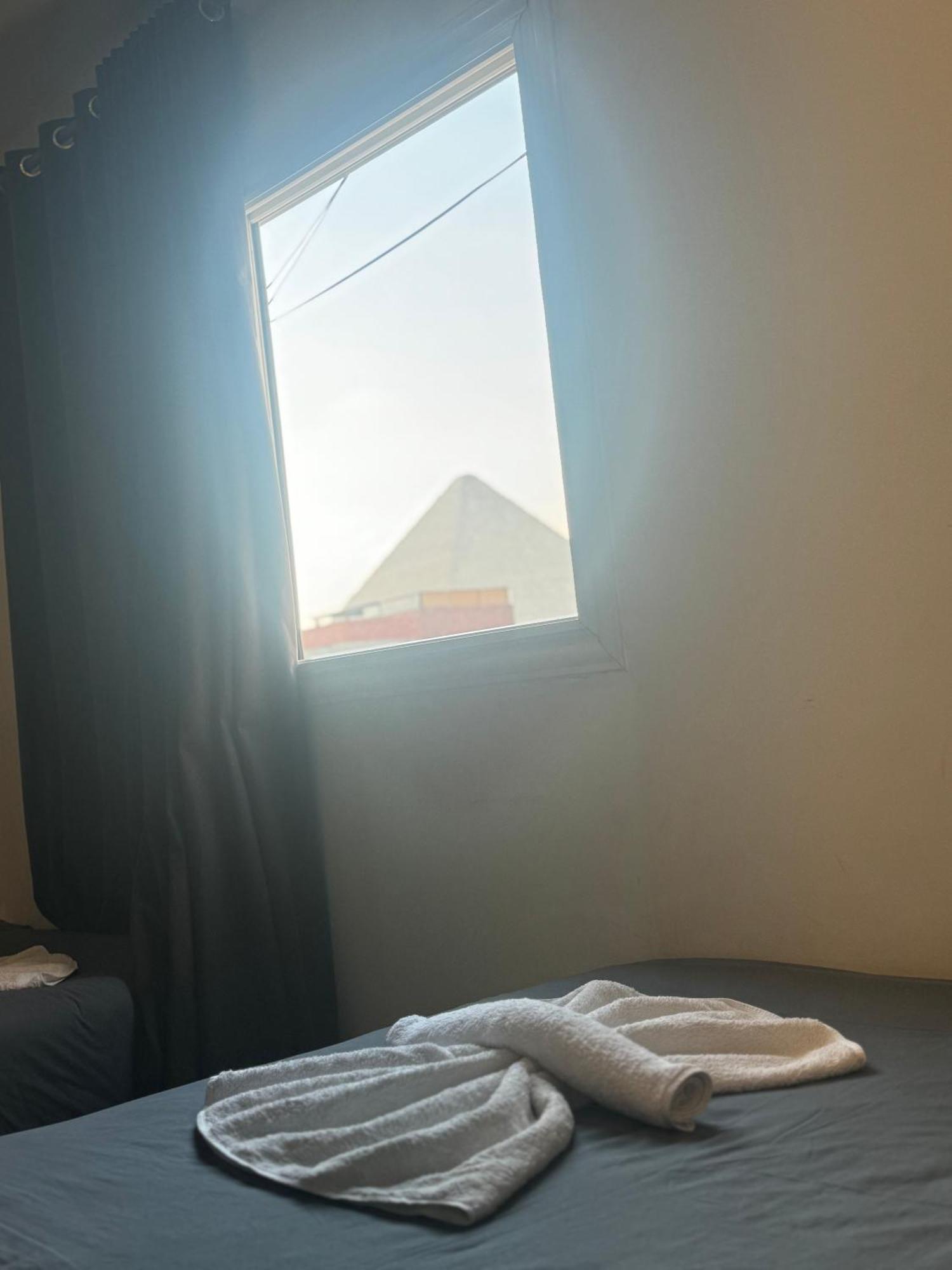 Pyramids And Sphinx Hotel Kafret el-Gabal Buitenkant foto