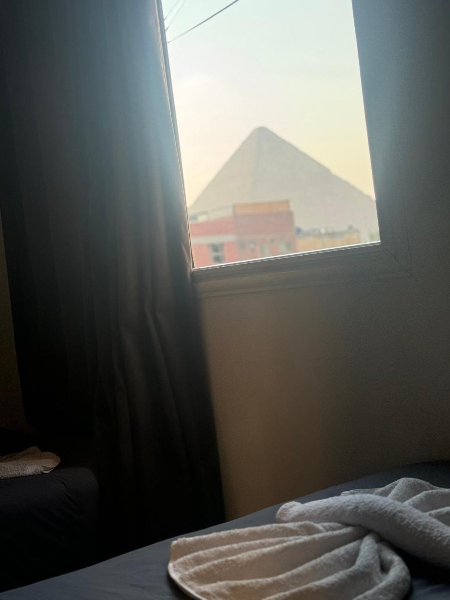 Pyramids And Sphinx Hotel Kafret el-Gabal Buitenkant foto